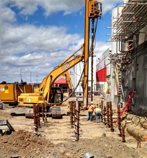 micro piling skid steer through|stelcor drilled in micropile installation.